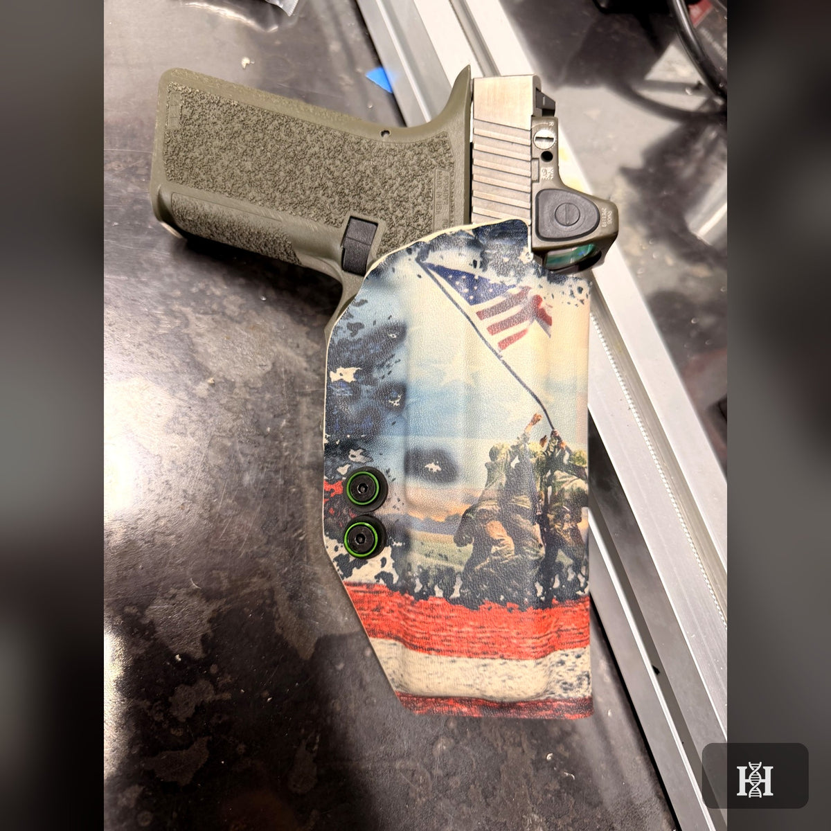 American flag Iwo Jima-print AIWB shell with pistol and red dot sight